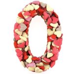 Number Zero, made from soft cushions in the shape of Hearts. Isolated on white